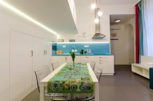 a dining room with a table and chairs at Sara's Apartment in Budapest