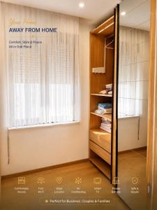 a room with a window and a book shelf at Luxury Budva Apartment in Budva
