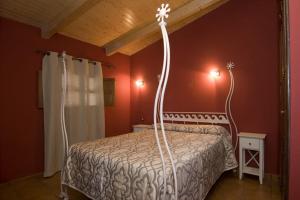 Ένα ή περισσότερα κρεβάτια σε δωμάτιο στο Pitogordo