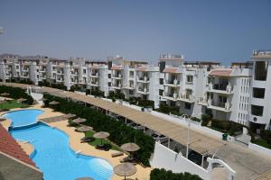 an aerial view of a resort with a swimming pool at Sharm Hills Azure Suite Topview in Sharm El Sheikh