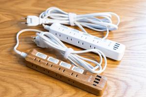 two nintendo wii controllers sitting on top of a table at 第2舞鶴ハイツ in Fukuoka