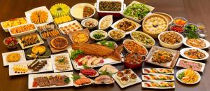 a table topped with lots of different types of food at Fuji Lake Hotel in Fujikawaguchiko
