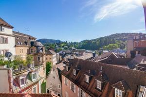 an overhead view of a city with buildings and trees at B10 Rooms in Baden-Baden