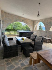 a living room with a couch and a table at Villa Bavaria in Starigrad