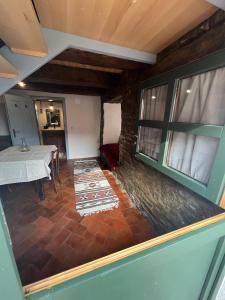 a view of a room with a table and a window at Archita 155 in Archita