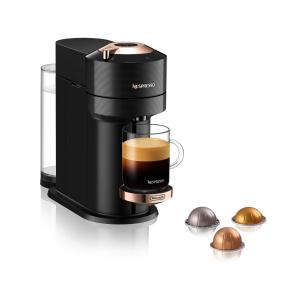a coffee maker with a cup of coffee at Appartement près des Plaines d'Abraham in Quebec City