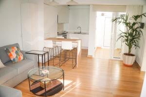 a living room with a couch and a table at Casa Ines in Playa Honda