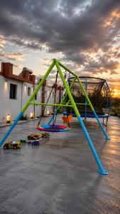 an empty roller coaster in a parking lot at Angelparadise village stefani in Stefáni