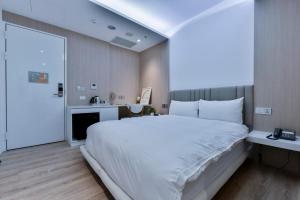 Postel nebo postele na pokoji v ubytování Hotel Mapp
