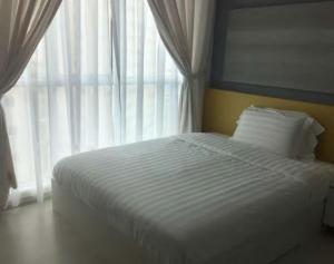 Ліжко або ліжка в номері Pearl Suite @ Straits Garden