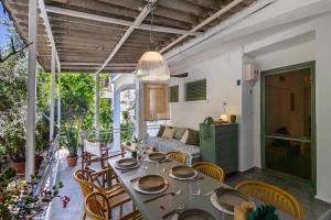 a dining room with a table and chairs at 7a old Marmaris house in Marmaris