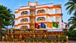 a hotel with flags in front of a building at HOTEL GOLDEN PALACE PVT LTD in Mumbai