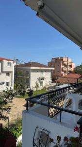a view from the balcony of a building at Roula's Apartment in Limenaria