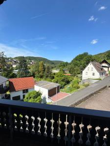 a view of a city from a balcony at Spessartblick in Heimbuchenthal