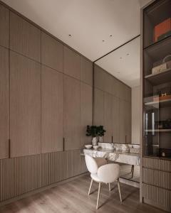 a dining room with a table and two chairs at FairMounts Plaza Inns Near Delhi International Airport in New Delhi +40 photos