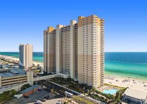 a view of the beach from the balcony of a building at Golden Hour Penthouse - TideWater Beach Resort 2700 in Panama City Beach