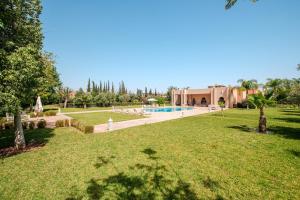 an image of a yard with a swimming pool at Luxury Palace in Marrakesh in Marrakesh
