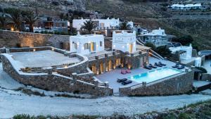 an aerial view of a villa with a swimming pool at Villa Evita Panormos private pool & jacouzzi in Mykonos