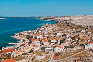 an aerial view of a town next to the ocean at Holiday Home Albina in Kustići