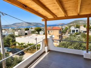 a balcony with a view of a city at Panorama in Porto Rafti