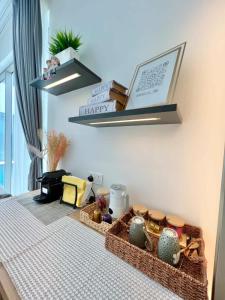 a table with baskets and vases on it at Rosella Chalet in Jabal Al Akhdar