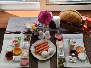 a table with a tray of food with eggs and vegetables at RamRamay in Qax +36 photos