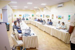 a group of people sitting at tables in a room at Abad Hotel in Mogadishu