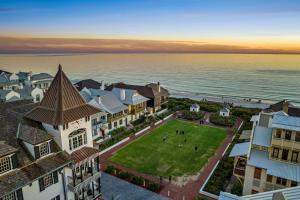 an aerial view of a resort with the ocean in the background at Serenity Now in Rosemary Beach