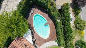 an overhead view of a swimming pool in a yard at Mhateria Relais - Relax in Villa con Piscina in Toscana in Rignano sullʼArno