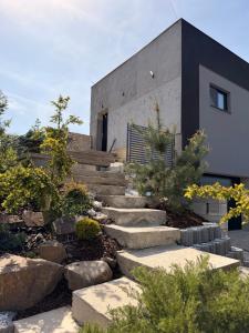 a set of stairs leading up to a house at Apartmán Natalka7 in Bartovice