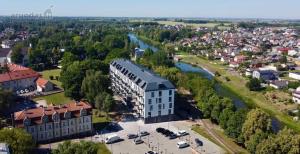 an aerial view of a city with a river at Apartment in the city center near park and river 26 in Marijampolė