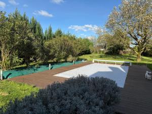 an aerial view of a patio with a pond at Sab in Beaudreix