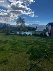 a view of a field with a tent at Quinta Paco de Lucía in Hacienda Santa Rosa