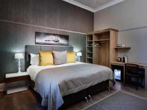 Ένα ή περισσότερα κρεβάτια σε δωμάτιο στο Cloud 9 Boutique Hotel and Spa