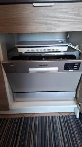 a computer system is sitting in a drawer at Terrazza Enjoy in Letojanni +43 photos