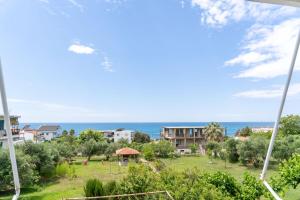 a view of the ocean from the apartment at Panagiota Lounge Sea View in Kanali