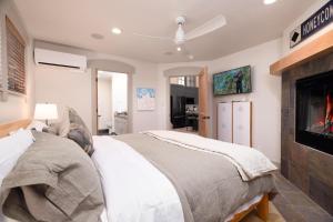 a man laying on a bed in a bedroom at First Tracks Townhome in Solitude +62 photos