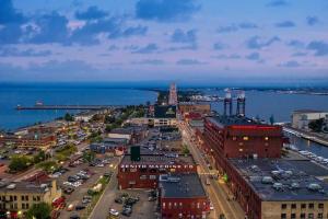 an aerial view of a city near the water at Lake Avenue Lofts- Cascade in Duluth