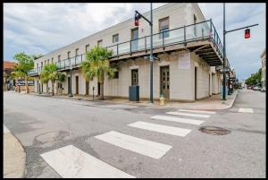 a building on the corner of a street at Downtown Mobile Gem Steps from Cruise & Train Terminals in Mobile