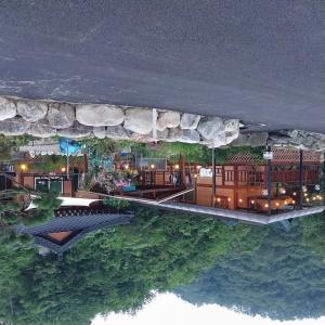 a rendering of a house on the water at Yangyang Haneul Cheon Ddaji in Yangyang