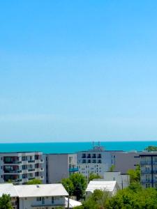 a view of a city with the ocean in the background at Apartamente & Studiouri Melia Eforie Nord in Eforie Nord +187 photos