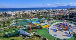 an amusement park with a water park with slides at Smirpark appartement in M'diq