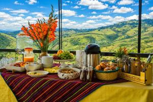 a table with food on it with a view of mountains at Mi Shalita in Santa Cruz +33 photos