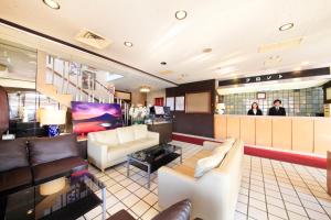 TV a/nebo společenská místnost v ubytování Fujinomiya Green Hotel