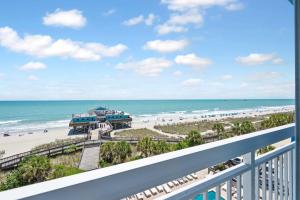 a view of the beach from the balcony of a condo at Amazing Large Private Studio Condo with Amazing View in Myrtle Beach +21 photos