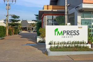 a sign for the entrance to a building at Impress Resort, Phuket - Free scheduled shuttle from Hotel to Phuket Airport in Thalang +5 photos