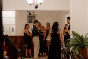 a bride and groom are kissing at their wedding ceremony at Casa Esmeralda Boutique Hotel in San José