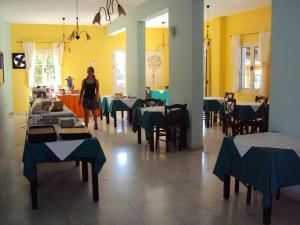 A restaurant or other place to eat at Mykali Hotel
