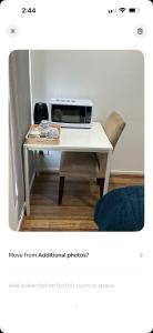 a white desk with a microwave on top of it at Lavish private room1 in Truganina
