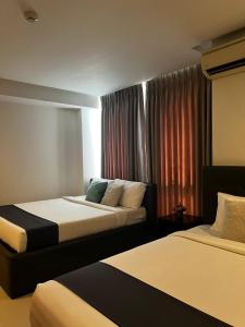 Fotografija v galeriji nastanitve The Upperhouse Hotel Boutique Stay with City & River Views v mestu Cagayan de Oro